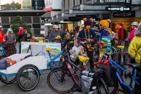Riders gathering on Te Hā Noa's Victoria Street for Jump(er) on a bike